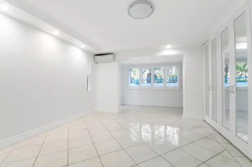 The same room after being virtually staged with modern furniture and decor by AI, ready for marketing.